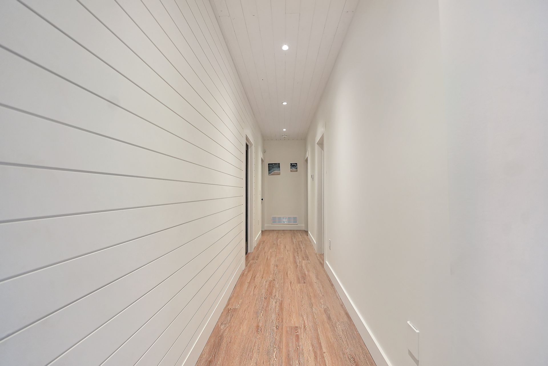 A bathroom with a lantern hanging from the ceiling