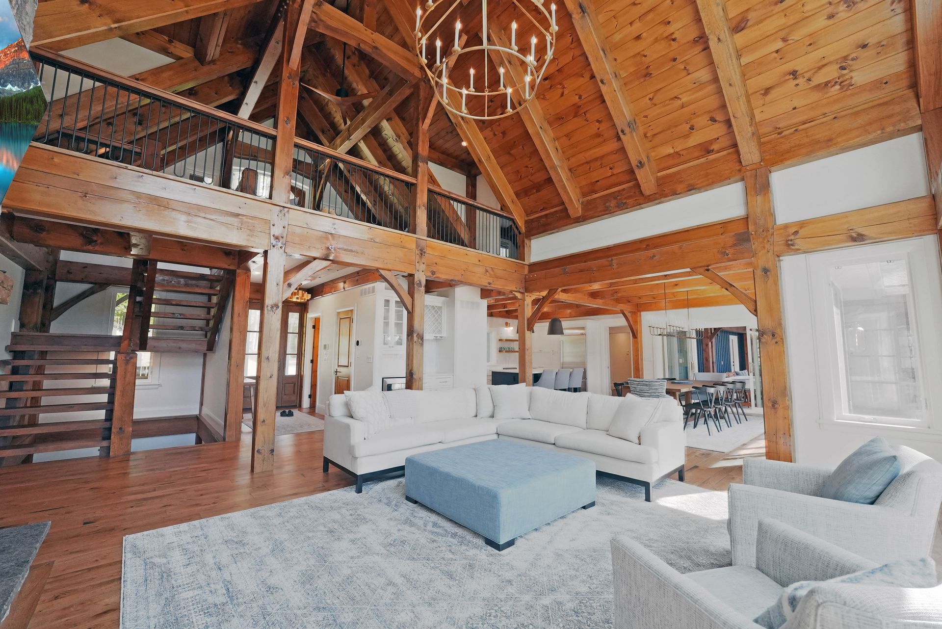 A room with a table and chairs in it