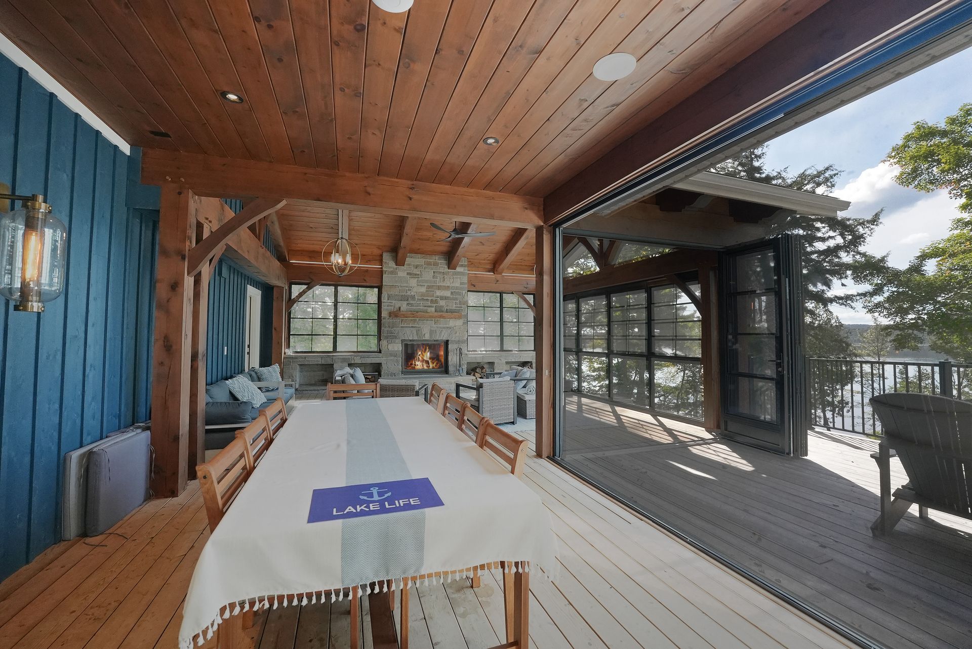 A bedroom with a large bed and a large window.