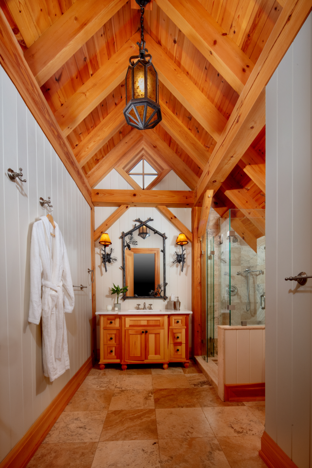 A bathroom with a lantern hanging from the ceiling