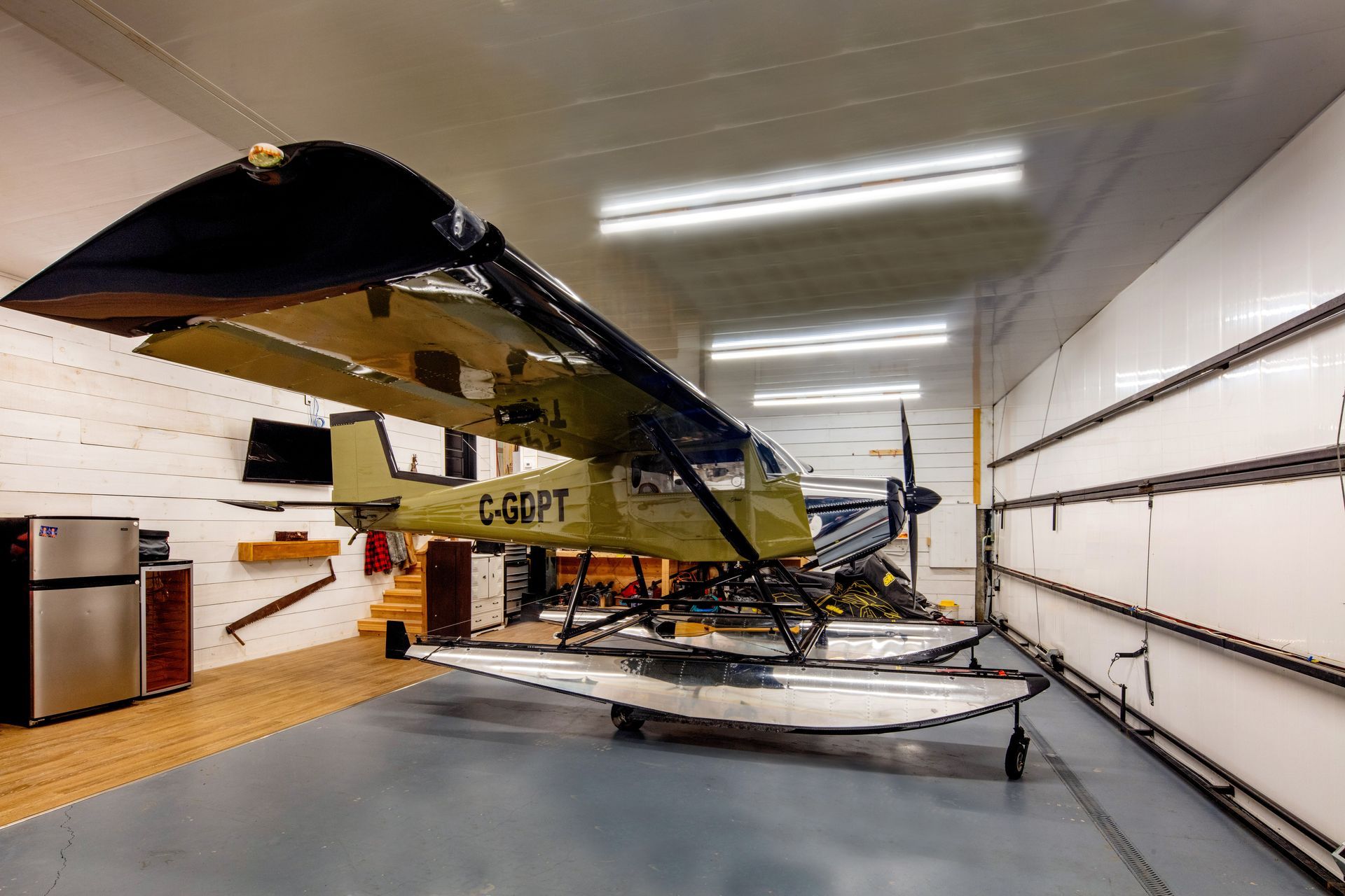 A wine cellar filled with lots of wine bottles and crates.