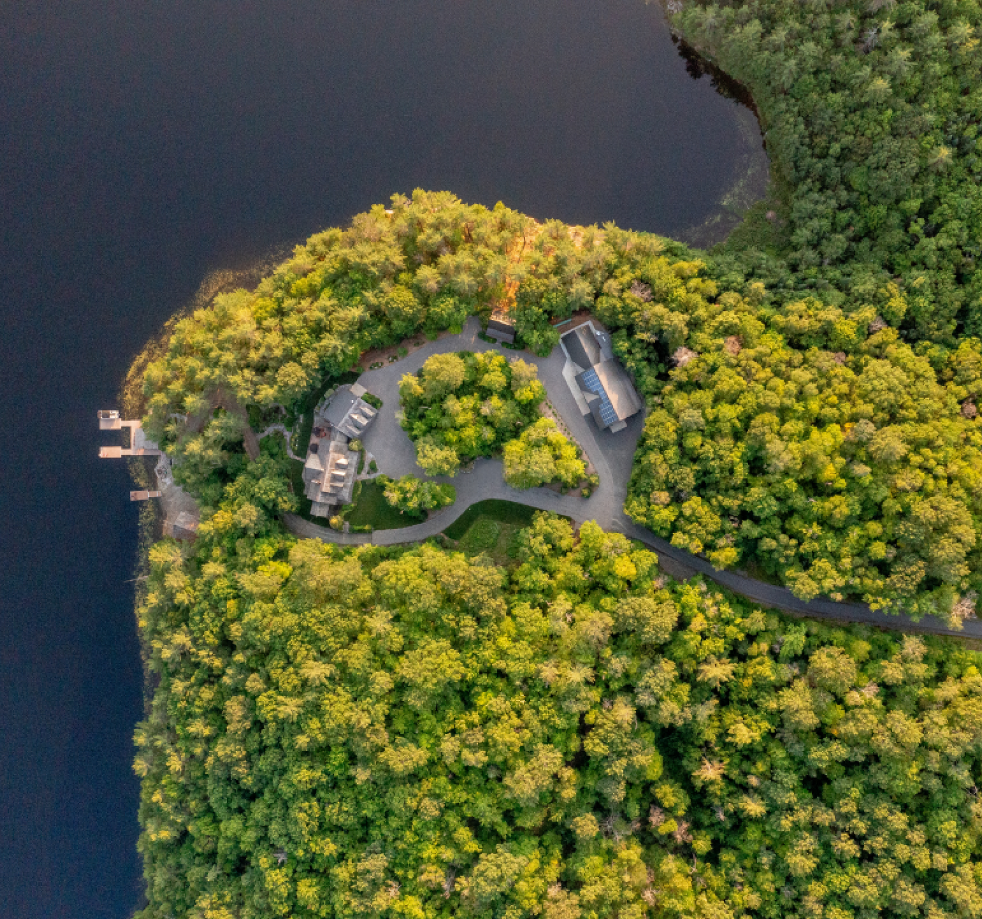 An aerial view of a small island in the middle of a lake