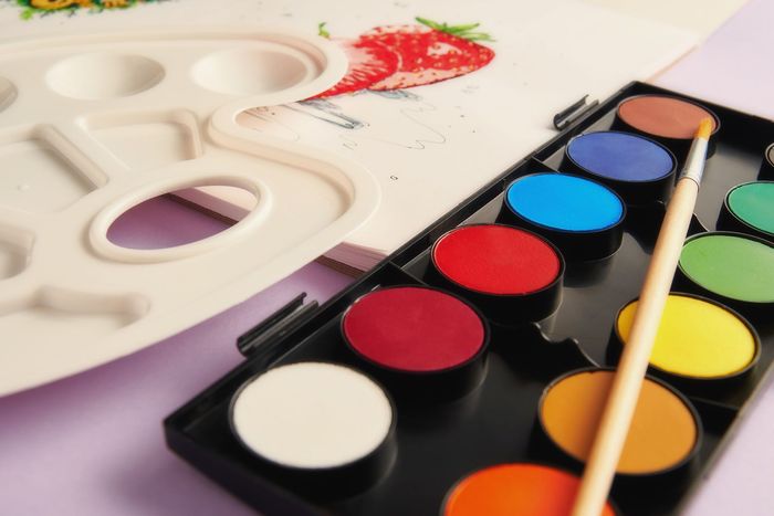 Colorful paints, brush, and palette — Urbana, IL — Art Coop