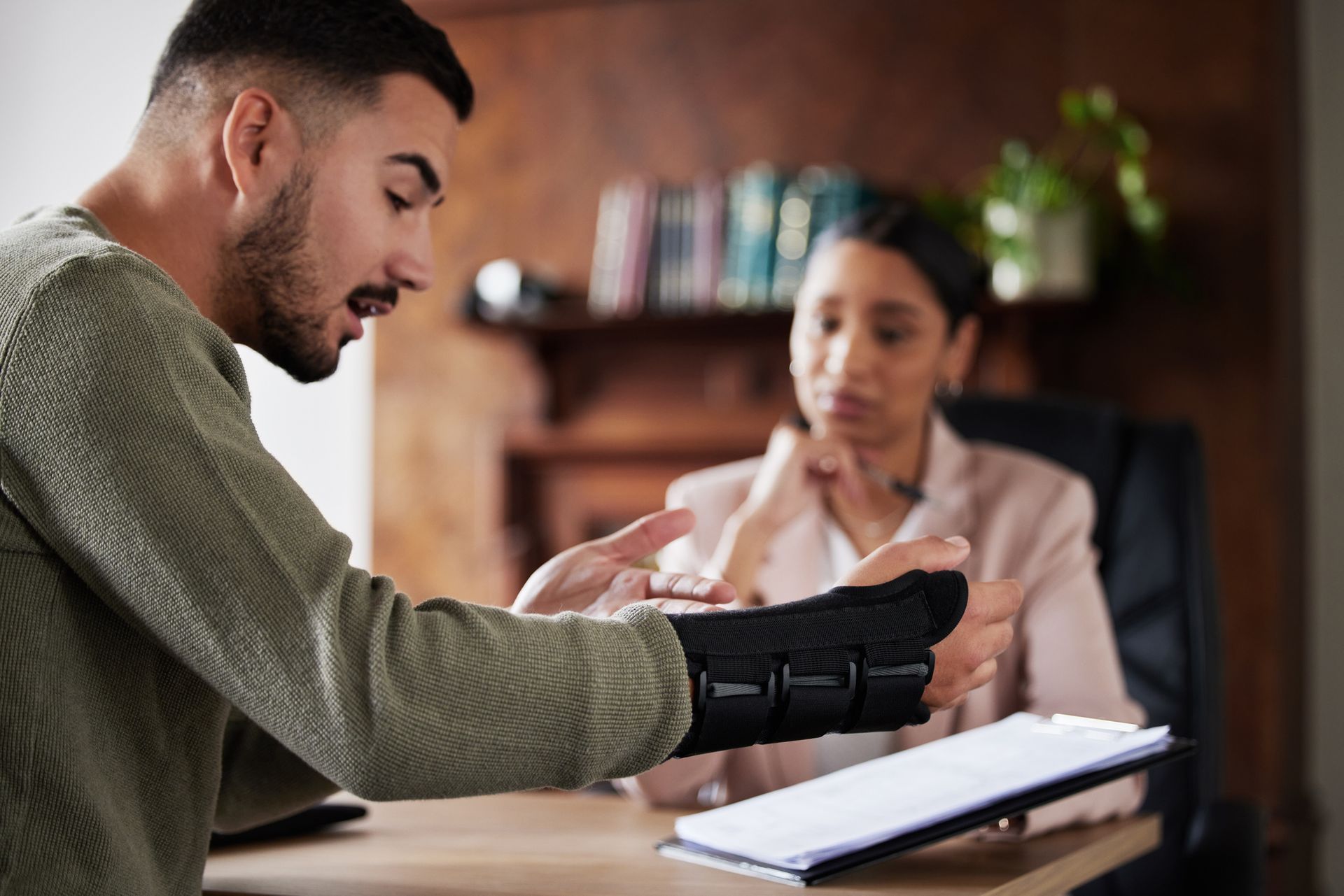 Man with lawyer woman planning on documents for insurance, compliance and HR agreement. Man with lawyer woman planning on documents for insurance, compliance and HR agreement.