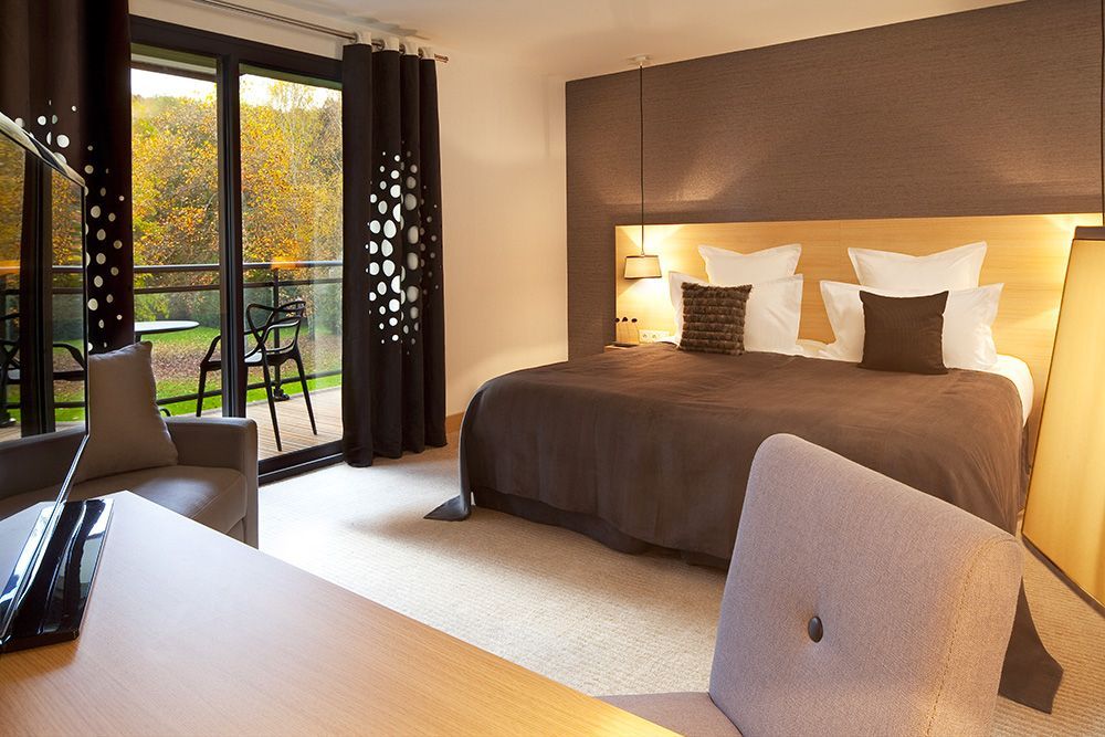 Chambre Coquelicot proposée à l'hôtel restaurant l'Aubinière situé en Val de Loire