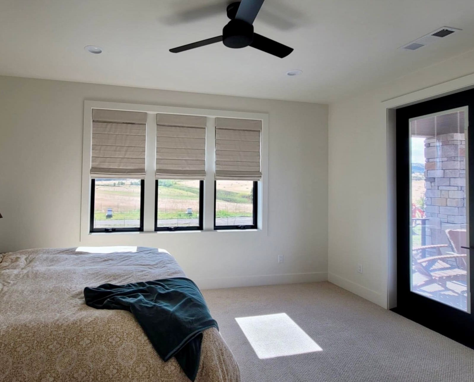 A bedroom with new blinds in Jacksonville, Oregon. 