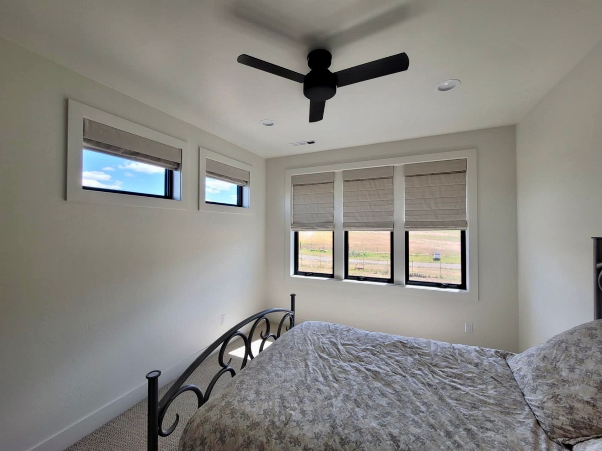 A bedroom with new blinds in Medford, Oregon.