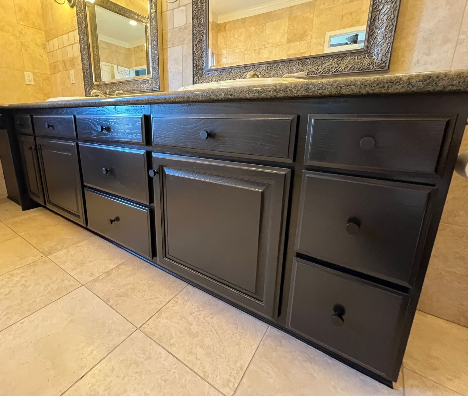 A close-up of a bathroom cabinet with new paint. 