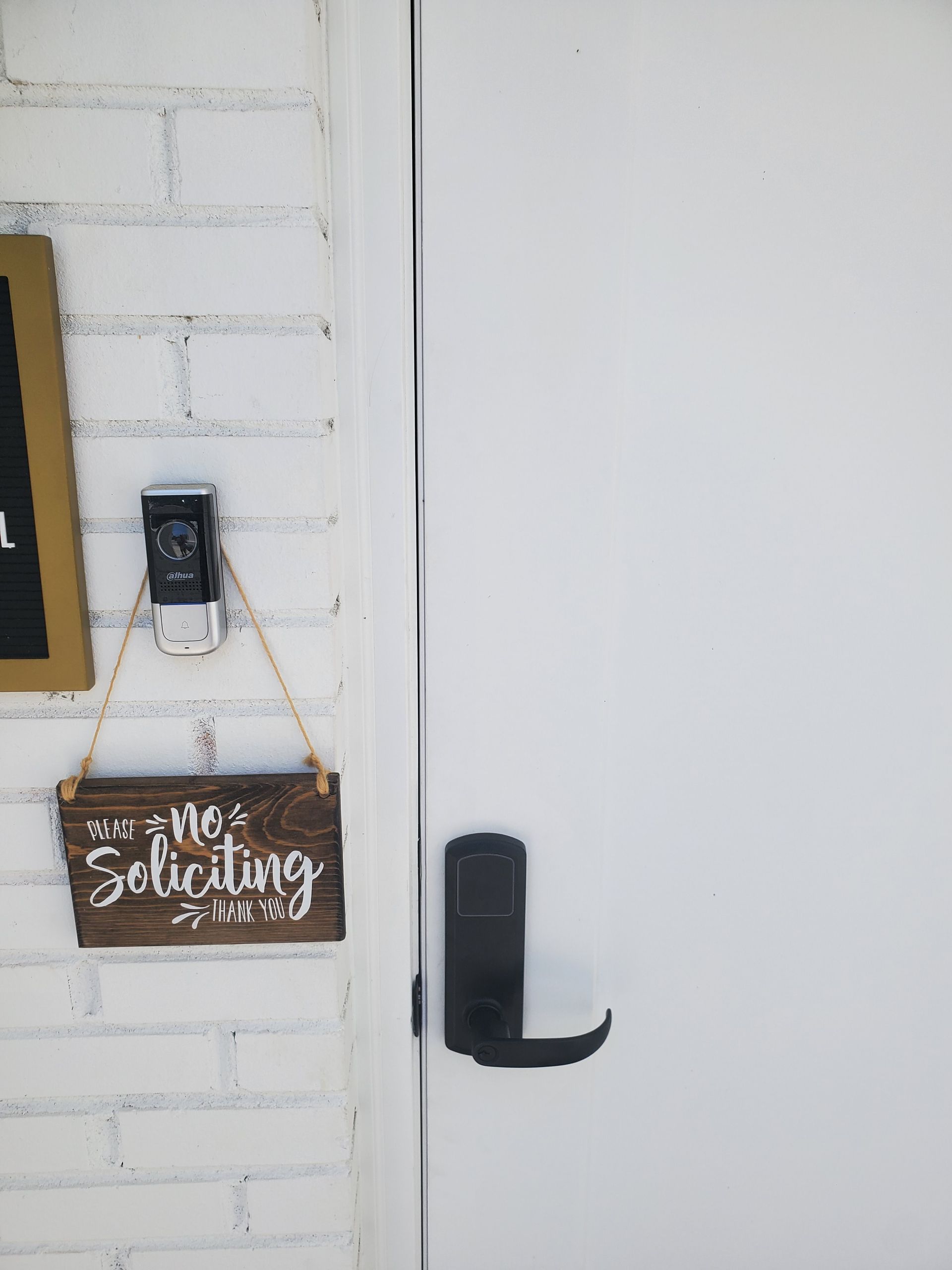White door and brick wall with