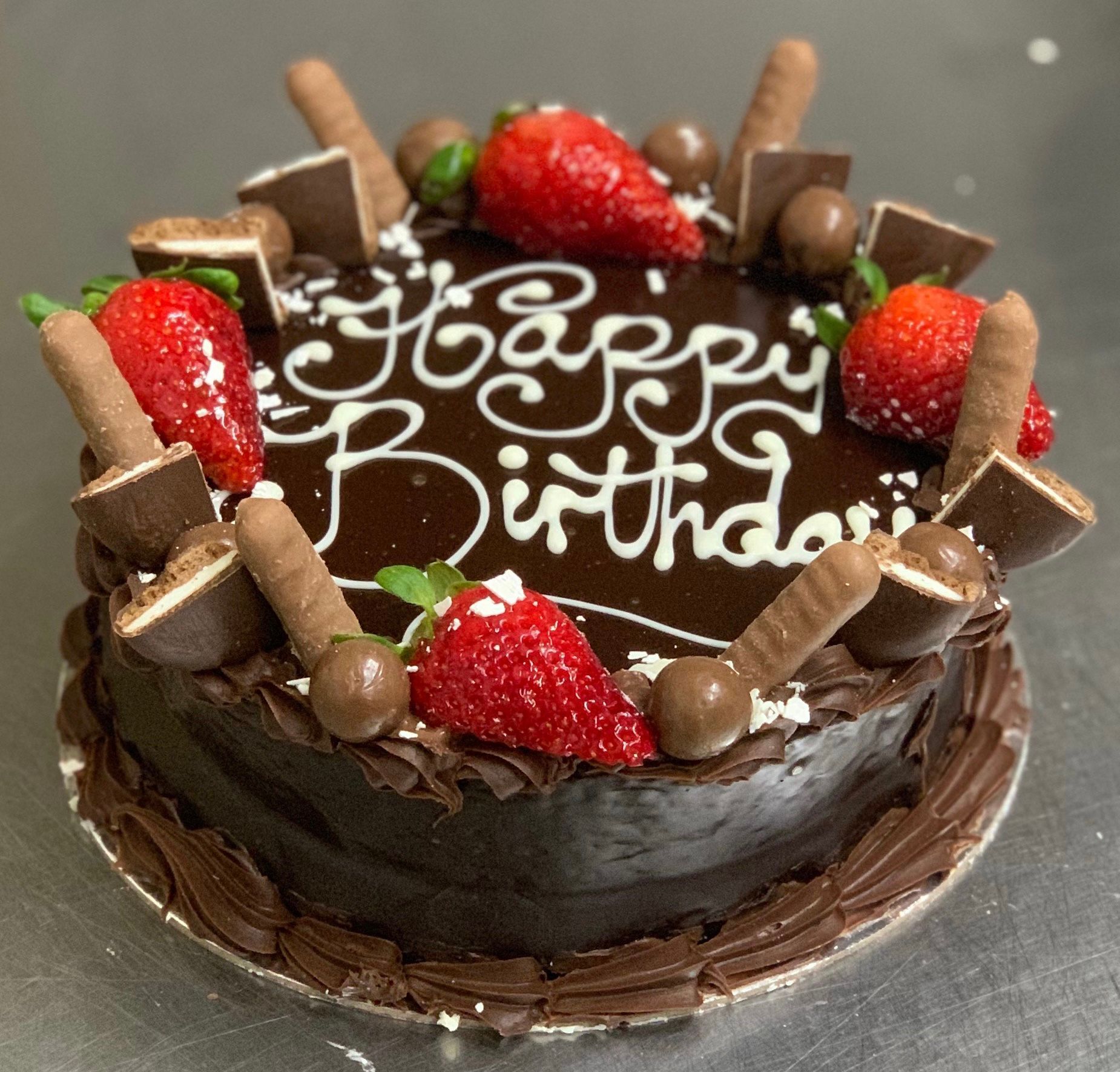 A Large Chocolate cake with toppings — Bread Basket in Kurri Kurri, NSW