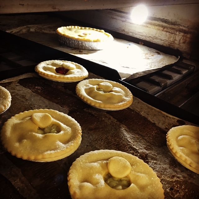 Pies baking in a warm oven, golden crusts— Bread Basket in Kurri Kurri, NSW