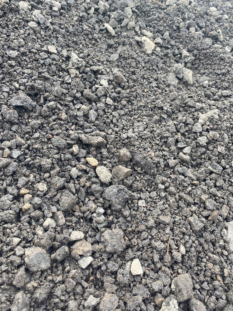 A close up of a pile of rocks on the ground.