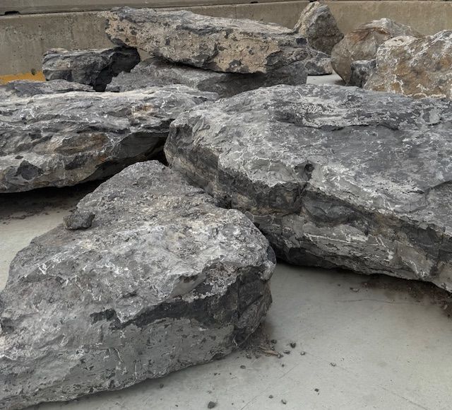 A black background with white text that says `` photo coming soon ''.