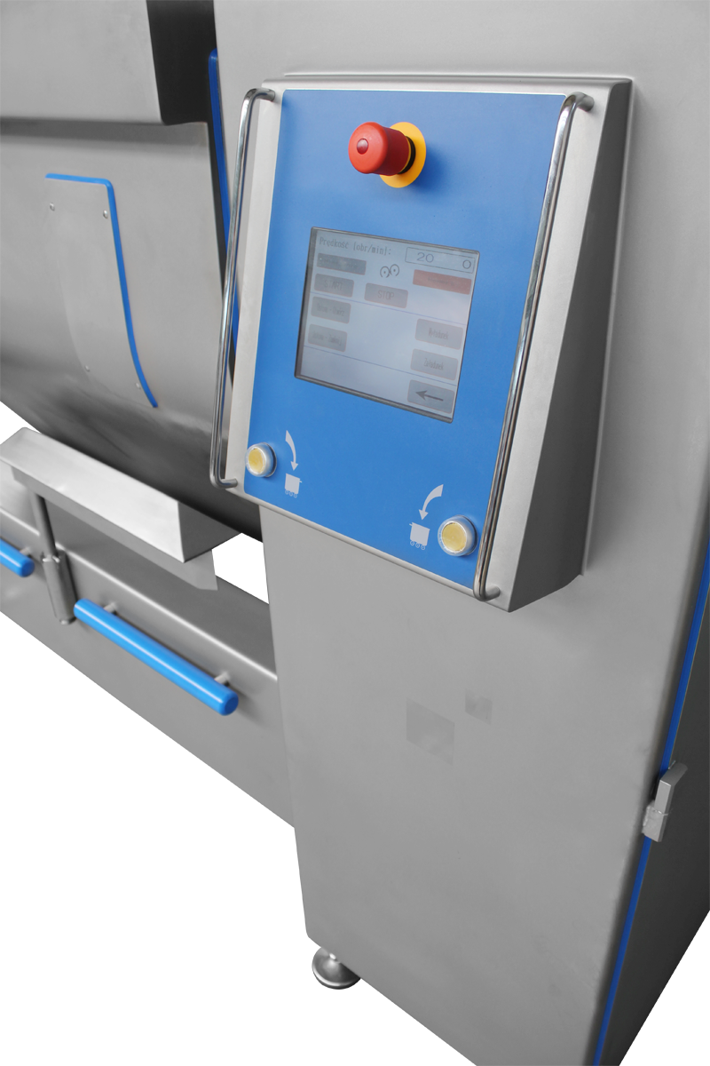 A stainless steel machine with a blue control panel and a red button.