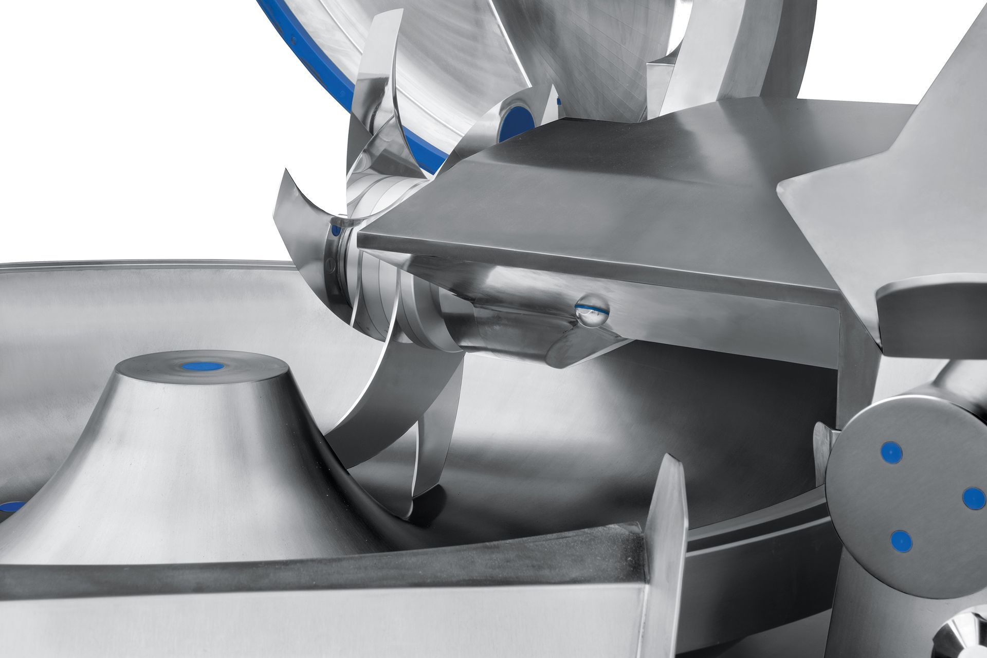 A close up of a stainless steel cutting machine