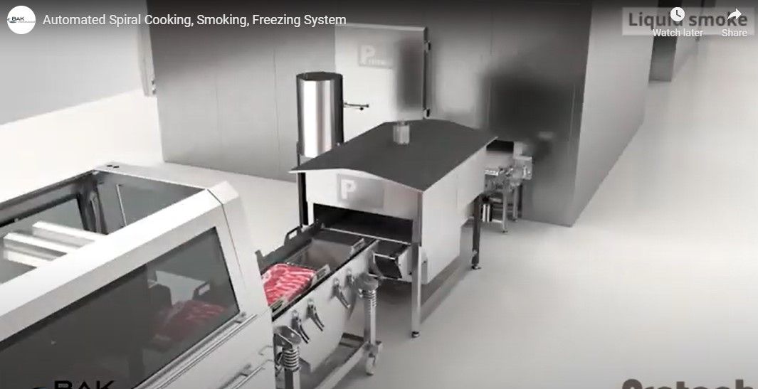 A machine is moving a piece of meat through a conveyor belt.