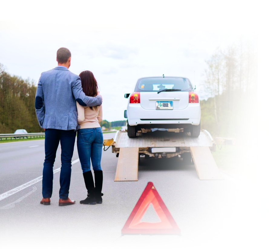 Man on phone next to car with open hood on roadside. | Chicago Cheap Tows