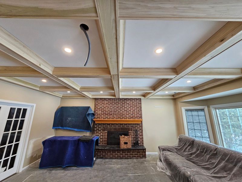 A living room with a fireplace and a couch