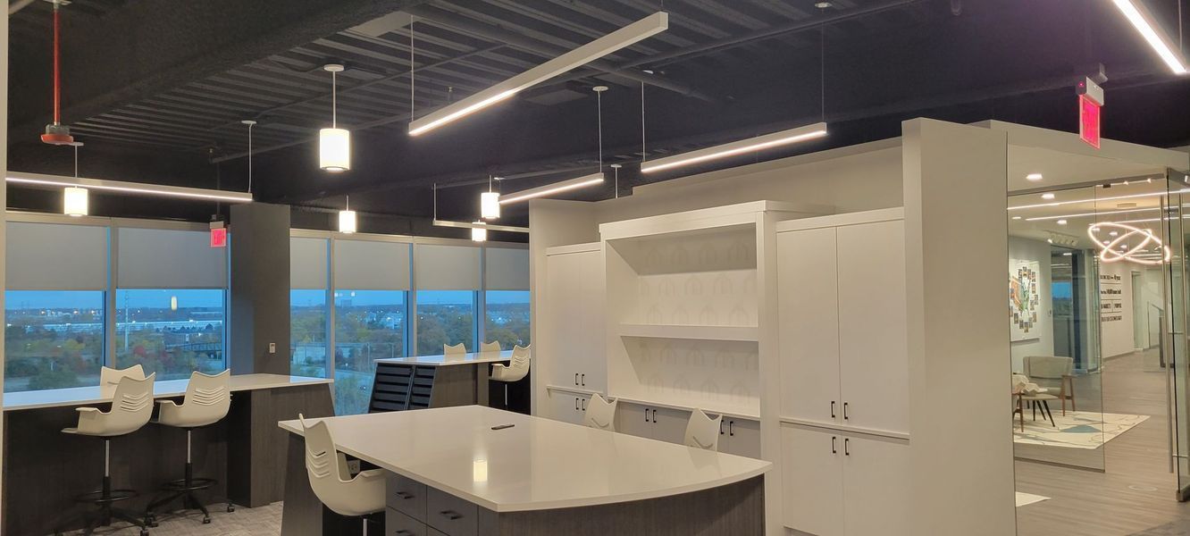 There is a large table in the middle of the room.