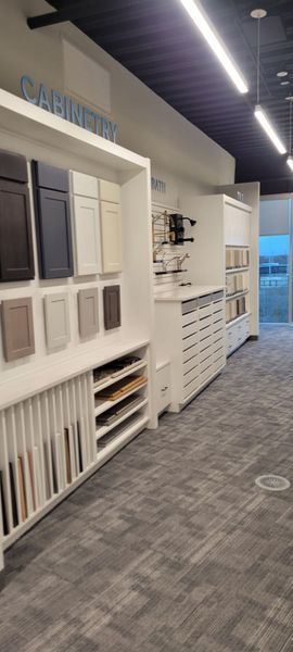 A room with a lot of shelves and cabinets in it.