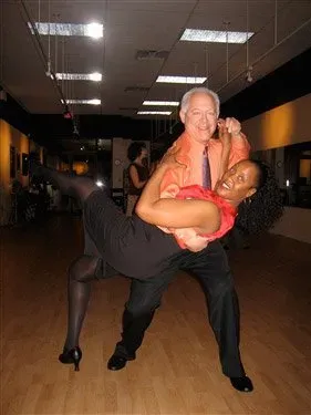Couple In A Tango Pose — New Castle, DE — The Ballroom By Bill Team