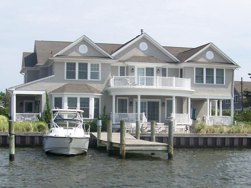House Roofing in front of waters - Roofing in Point Pleasant, NJ