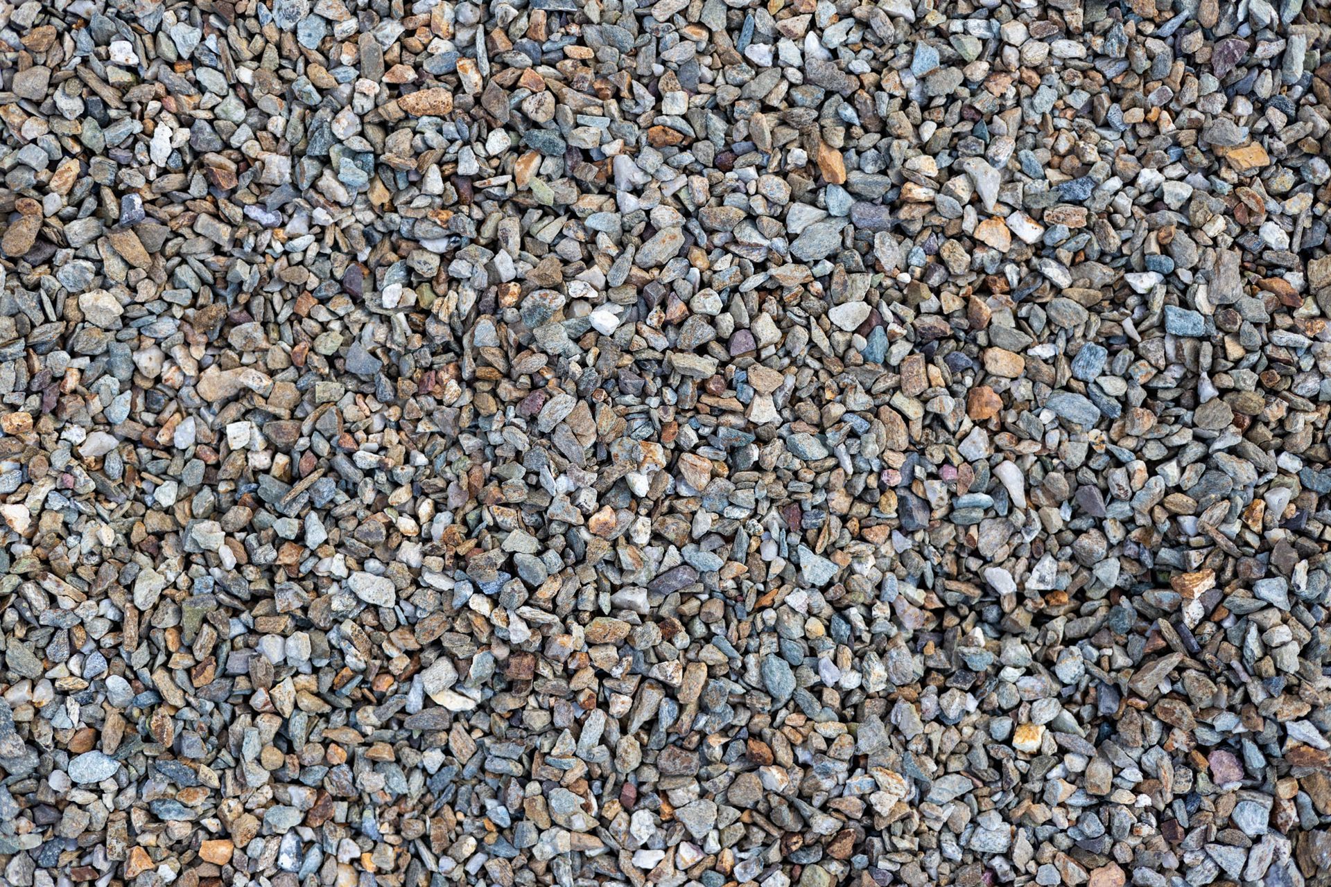 Close-up of assorted gray, brown, and tan gravel stones