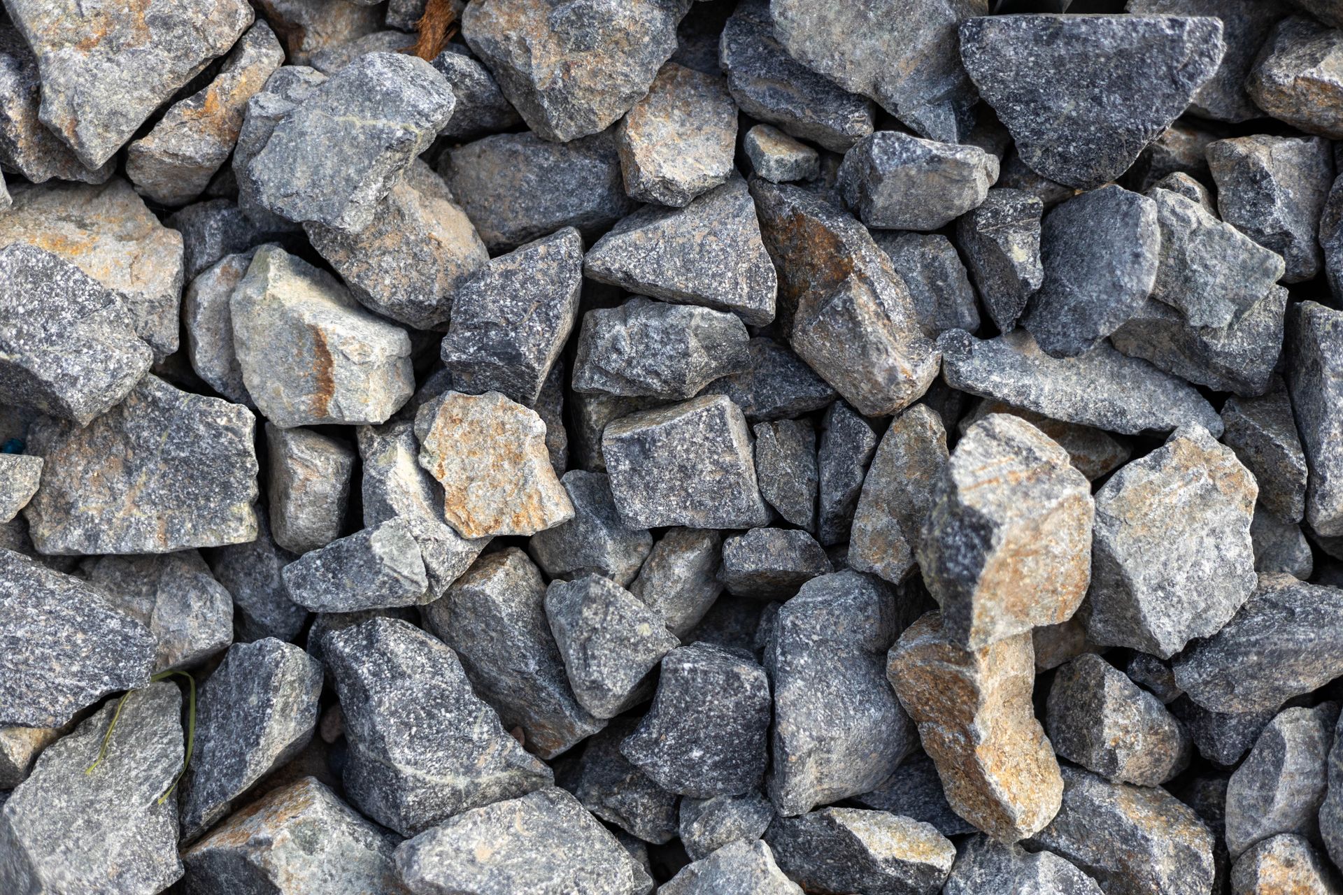 Close-up of gray gravel stones filling the frame