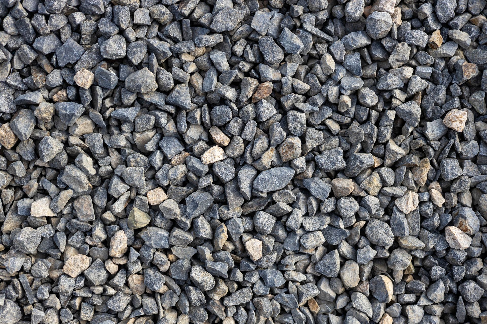 Close-up of gray gravel stones filling the frame