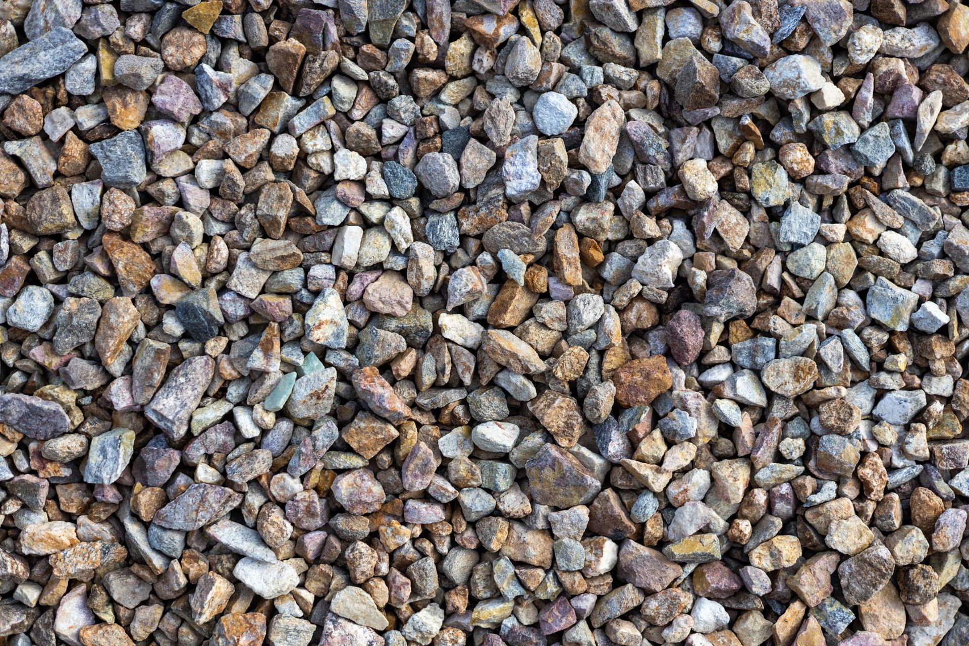 Close-up of a pile of small multicolored gravel stones.
