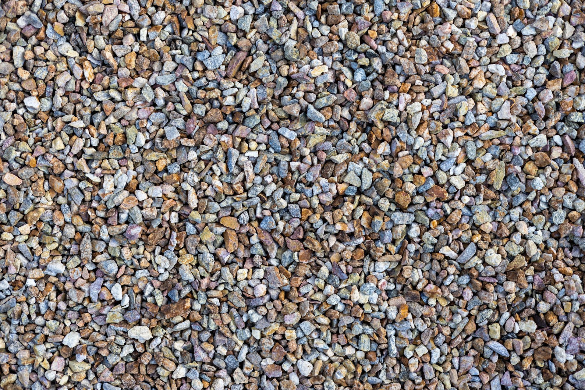 Close-up of a pile of small multicolored gravel stones.