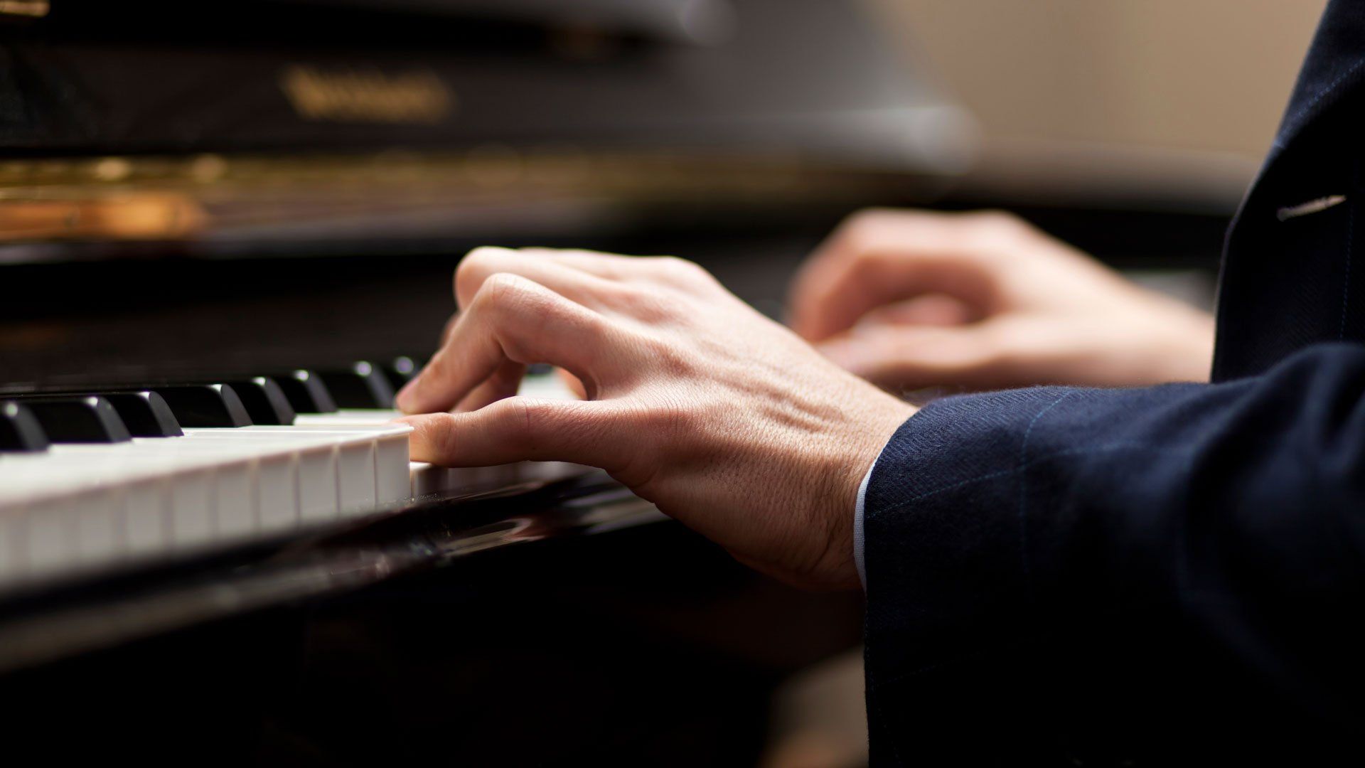 Man Playing a Piano — Jenkintown, PA — Ken Coleman's Piano Service