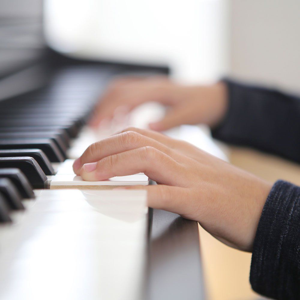 Hands of A Kid Playing a Piano — Jenkintown, PA — Ken Coleman's Piano Service