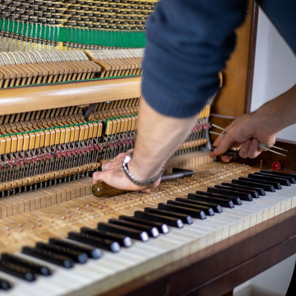 Man Tuning Piano — Jenkintown, PA — Ken Coleman's Piano Service