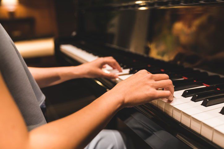 Newly Repaired Piano Being Played — Jenkintown, PA — Ken Coleman's Piano Service