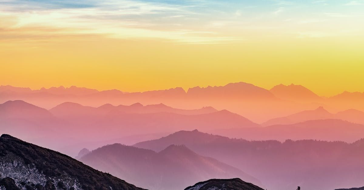 A view of a sunset over a mountain range