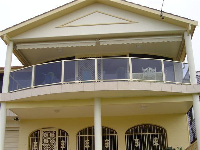 Large House With A Balcony And A Roof — Decorative Aluminium Works In Cardiff, NSW