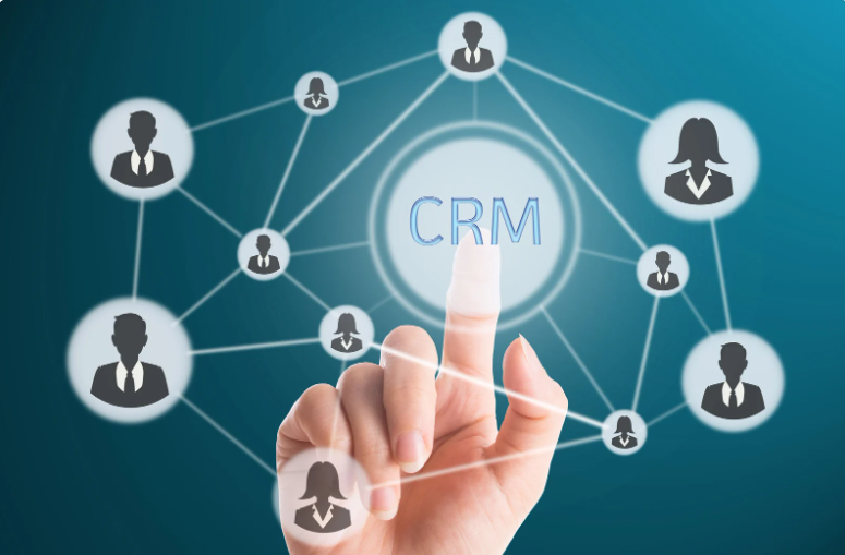 A person is pressing a button that says crm on a screen.