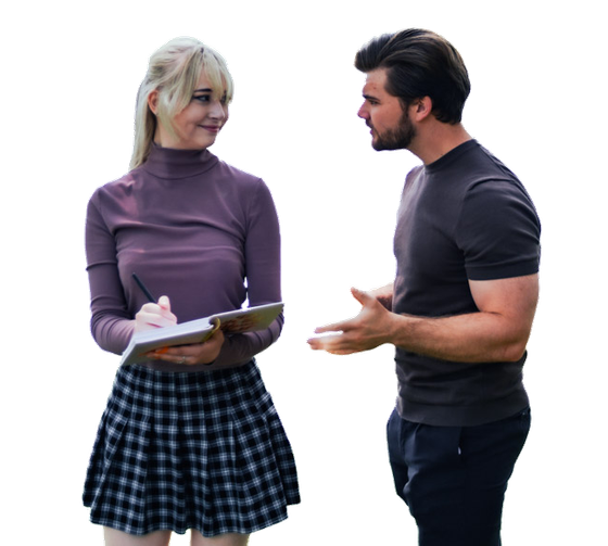 A top real estate agent in the Black Hills, SD, is talking to his wife, who is holding a clipboard