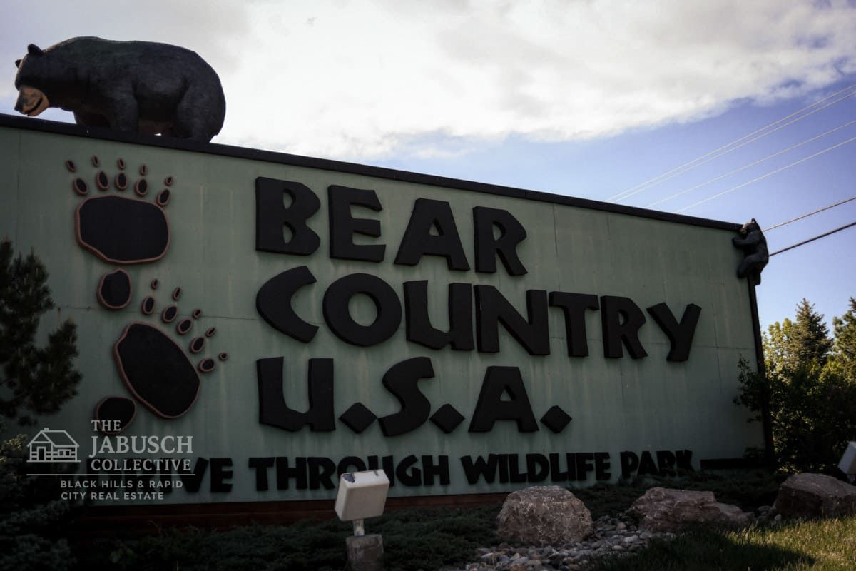 A bear statue is on top of a
