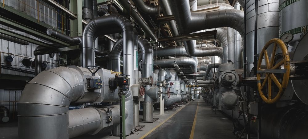 A factory filled with lots of pipes and valves.