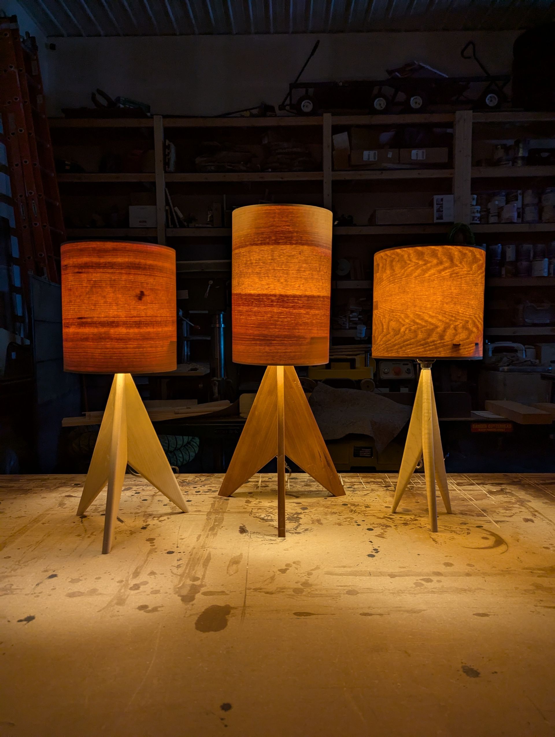 three wood veneer lamps