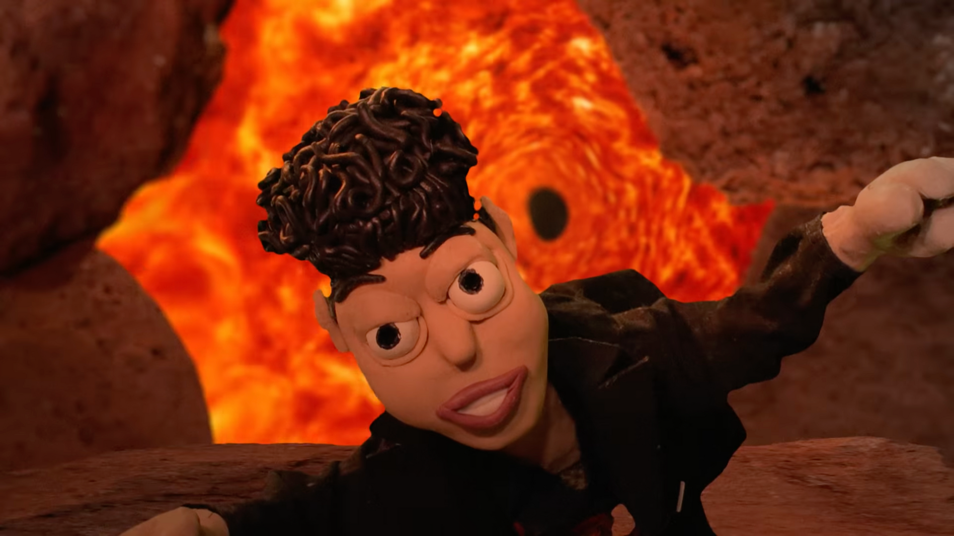 A cartoon character is standing in front of a volcano.