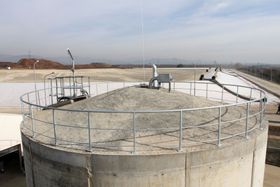 Industrial waste storage tank used for containment and treatment of process materials