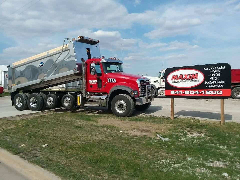 Dump Truck Unloading The Sand — Des Moines, IA — Maxim Trucking & Materials