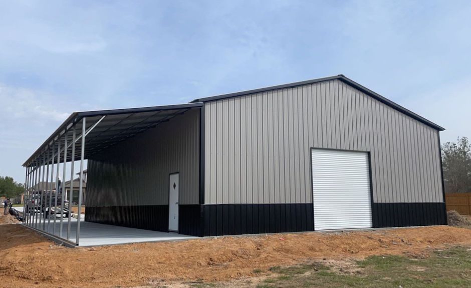 40'x60'x16' Vertical Combo Commercial Metal Building with Lean To.  Silver and navy blue panels with blue trim. One12'x12' one white walk in door.