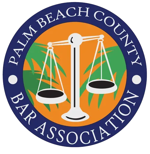 Palm Beach County Bar Association logo: Scales of justice over orange, green palm tree background within blue circle.