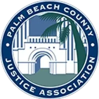Palm Beach County Justice Association seal: Blue circle, white building with archway, palm frond, text.