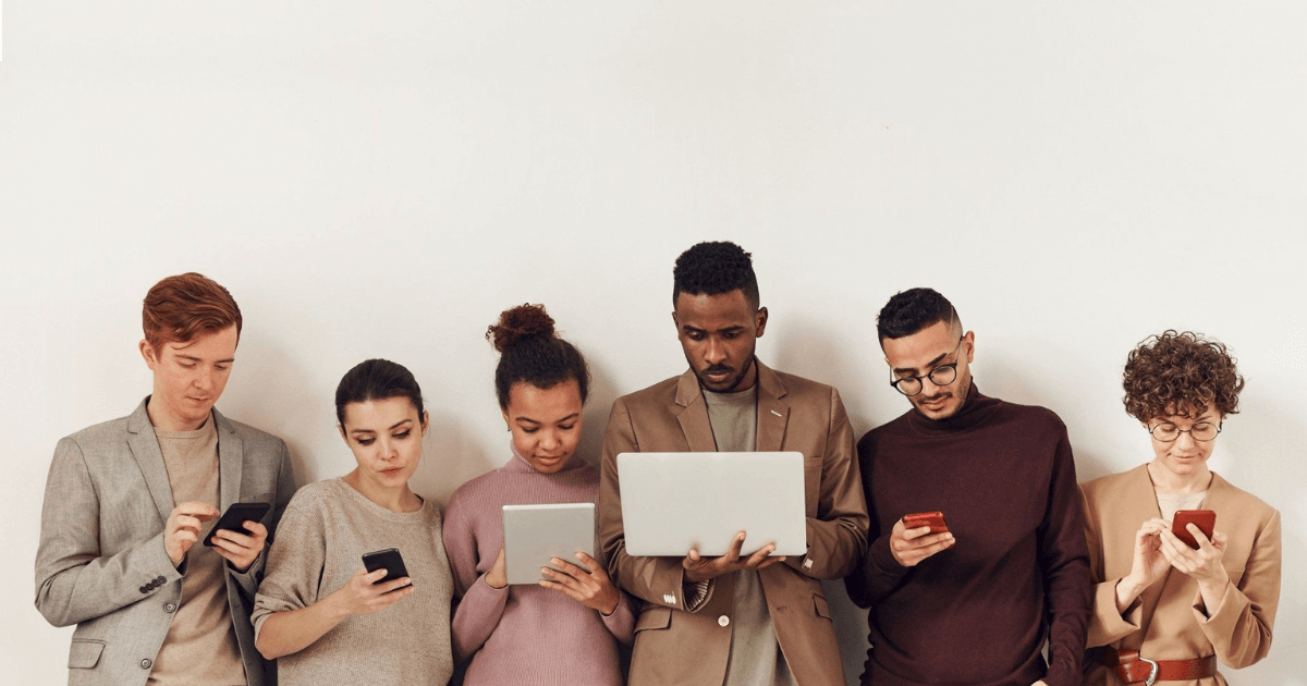 Group of people checking a website on their phone