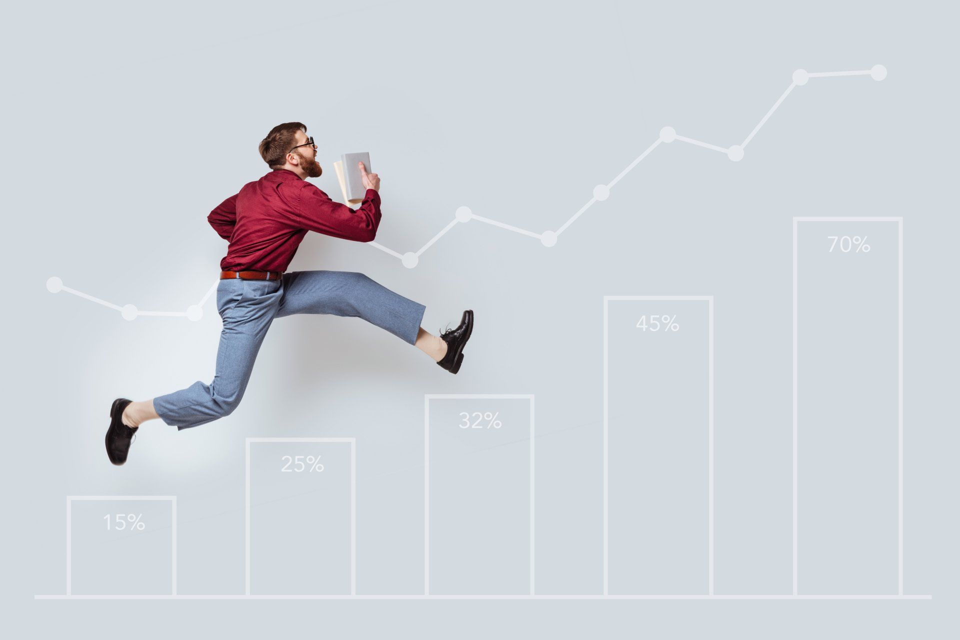 a man is jumping in the air in front of a graph .